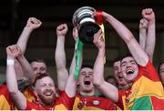 24 March 2018; Carlow joint captains Eoin Nolan, left, and Richard Cody lift the cup after the Allianz Hurling League Division 2A Final match between Westmeath and Carlow at O'Moore Park in Portlaoise, Laois. Photo by Piaras Ó Mídheach/Sportsfile