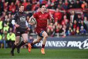 24 March 2018; Alex Wootton of Munster gets away from Rhys Patchell of Scarlets on his way to scoring a try which was subsequently disallowed during the Guinness PRO14 Round 18 match between Munster and Scarlets at Thomond Park in Limerick. Photo by Diarmuid Greene/Sportsfile