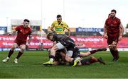 24 March 2018; James Hart of Munster scores his side's first try despite the efforts of Aled Davies and Will Boyde of Scarlets during the Guinness PRO14 Round 18 match between Munster and Scarlets at Thomond Park in Limerick. Photo by Diarmuid Greene/Sportsfile