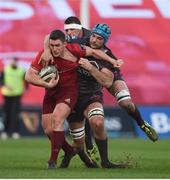 24 March 2018; Ian Keatley of Munster is tackled by Tadhg Beirne and Aaron Shingler of Scarlets during the Guinness PRO14 Round 18 match between Munster and Scarlets at Thomond Park in Limerick. Photo by Diarmuid Greene/Sportsfile