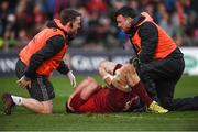 24 March 2018; Tommy O'Donnell of Munster receives medical attention before leaving the pitch during the Guinness PRO14 Round 18 match between Munster and Scarlets at Thomond Park in Limerick. Photo by Diarmuid Greene/Sportsfile
