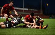 24 March 2018; Alex Wootton of Munster scores his side's second try despite the efforts of Scott Williams of Scarlets and Tom Varndell of Scarlets during the Guinness PRO14 Round 18 match between Munster and Scarlets at Thomond Park in Limerick. Photo by Diarmuid Greene/Sportsfile