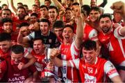 24 March 2018; Cuala captain Paul Schutte, centre, and his team-mates celebrate in the dressing room after the AIB GAA Hurling All-Ireland Senior Club Championship Final replay match between Cuala and Na Piarsaigh at O'Moore Park in Portlaoise, Laois. Photo by Piaras Ó Mídheach/Sportsfile