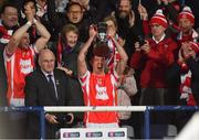 24 March 2018; Cuala captain Paul Schutte lifts the Tommy Moore Cup in the company of GAA President John Horan after the AIB GAA Hurling All-Ireland Senior Club Championship Final replay match between Cuala and Na Piarsaigh at O'Moore Park in Portlaoise, Laois. Photo by Piaras Ó Mídheach/Sportsfile