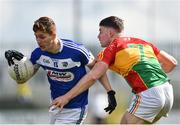25 March 2018; Evan O’Carroll of Laois in action against Ciaran Moran of Carlow during the Allianz Football League Division 4 Round 7 match between Carlow and Laois at Netwatch Cullen Park in Carlow. Photo by Seb Daly/Sportsfile