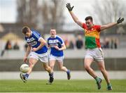 25 March 2018; Stephen Attride of Laois in action against Eoghan Ruth of Carlow during the Allianz Football League Division 4 Round 7 match between Carlow and Laois at Netwatch Cullen Park in Carlow. Photo by Seb Daly/Sportsfile