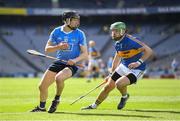 25 March 2018; Donal Burke of Dublin in action against James Barry of Tipperary during the Allianz Hurling League Division 1 Quarter-Final match between Dublin and Tipperary at Croke Park in Dublin. Photo by Stephen McCarthy/Sportsfile