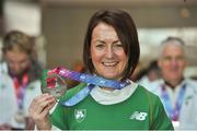 25 March 2018; Irish Masters team member Michelle Kenny from Leevale AC, Co. Cork with her bronze medal which she won for the Women's W35 5K cross country event during the European Masters Indoor Track & Field Championships in Madrid, at Dublin Airport in Dublin. Photo by Tomás Greally/Sportsfile