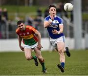 25 March 2018; John O’Loughlin of Laois in action against Sean Murphy of Carlow during the Allianz Football League Division 4 Round 7 match between Carlow and Laois at Netwatch Cullen Park in Carlow. Photo by Seb Daly/Sportsfile