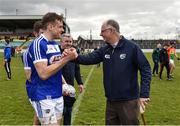 25 March 2018; Kieran Lillis of Laois is congratulated by Peter O'Neill,  Chairman Laois County Board, following their side's victory during the Allianz Football League Division 4 Round 7 match between Carlow and Laois at Netwatch Cullen Park in Carlow. Photo by Seb Daly/Sportsfile