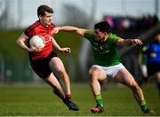 25 March 2018; Conor Maginn of Down is tackled by Donal Keogan of Meath during the Allianz Football League Division 2 Round 7 match between Meath and Down at Páirc Tailteann in Navan, Co Meath. Photo by Ramsey Cardy/Sportsfile