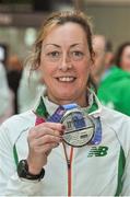25 March 2018; Irish Masters team member Maggie O'Connor from  St Joseph's AC, Co. Kilkenny, with her silver medal which she won in the Women's over 45 walk team event, during European Masters Indoor Track & Field Championships in Madrid, at Dublin Airport in Dublin. Photo by Tomás Greally/Sportsfile
