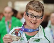 25 March 2018; Team manager Anne Gormley from Donore Harriers, Dublin, with her silver which she won in the Womens's over 40 walk event, during European Masters Indoor Track & Field Championships in Madrid, at Dublin Airport in Dublin. Photo by Tomás Greally/Sportsfile