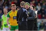 25 March 2018; Eamonn Doherty of Donegal, left, and Donegal manager Declan Bonner, right, confront Referee Anthony Nolan after the Allianz Football League Division 1 Round 7 match between Donegal and Mayo at MacCumhaill Park in Ballybofey, Donegal. Photo by Oliver McVeigh/Sportsfile
