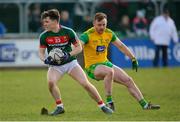 25 March 2018; Conor Loftus of Mayo in action against Eamonn Doherty of Donegal during the Allianz Football League Division 1 Round 7 match between Donegal and Mayo at MacCumhaill Park in Ballybofey, Donegal. Photo by Oliver McVeigh/Sportsfile