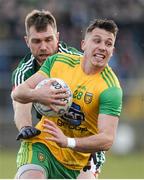 25 March 2018; Paul Brennan of Donegal  in action against Seamus O'Shea of Mayo during the Allianz Football League Division 1 Round 7 match between Donegal and Mayo at MacCumhaill Park in Ballybofey, Donegal. Photo by Oliver McVeigh/Sportsfile