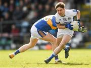 25 March 2018; Stephen Murray of Cavan gets past Conor Sweeney of Tipperary during the Allianz Football League Division 2 Round 7 match between Cavan and Tipperary at Kingspan Breffni in Cavan. Photo by Piaras Ó Mídheach/Sportsfile