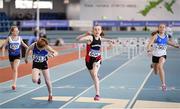 25 March 2018; Ruby Reynolds of Menapians A.C., Co Wexford, second from right, crosses the line to win the Girls U13 60mH event during Day 3 of the Irish Life Health National Juvenile Indoor Championships at Athlone IT, in Athlone, Westmeath. Photo by Sam Barnes/Sportsfile