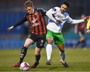 26 March 2018; JJ Lunney of Bohemians in action against Kaleem Simon of Cabinteely during the EA SPORTS Cup First Round match between Bohemians and Cabinteely at Dalymount Park in Dublin.  Photo by David Fitzgerald/Sportsfile