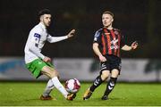 26 March 2018; Jamie Hamilton of Bohemians in action against Keith Dalton of Cabinteely during the EA SPORTS Cup First Round match between Bohemians and Cabinteely at Dalymount Park in Dublin. Photo by David Fitzgerald/Sportsfile