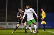 26 March 2018; Kaleem Simon of Cabinteely in action against Jamie Hamilton of Bohemians during the EA SPORTS Cup First Round match between Bohemians and Cabinteely at Dalymount Park in Dublin. Photo by David Fitzgerald/Sportsfile