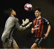 26 March 2018; Rob Manley of Bohemians in action against Stephen McGuinness of Cabinteely the EA SPORTS Cup First Round match between Bohemians and Cabinteely at Dalymount Park in Dublin.  Photo by David Fitzgerald/Sportsfile