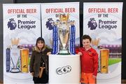 27 March 2018; Kaia and Leonardo Berzans from Dun Laoghaire, Dublin, with the Premier League trophy during the Carling Ireland Premier League Retail Trophy Tour in Tesco Bloomfield Shopping Centre, Dun Laoghaire, Co Dublin. Photo by Eóin Noonan/Sportsfile
