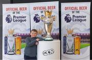 27 March 2018; Joe Byrne, age 8, from Monkstown, Dublin, with the Premier League trophy during the Carling Ireland Premier League Retail Trophy Tour in Tesco Bloomfield Shopping Centre, Dun Laoghaire, Co Dublin. Photo by Eóin Noonan/Sportsfile