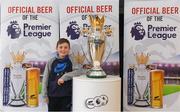 27 March 2018; Jack Byrne, age 11, from Monkstown, Dublin, with the Premier League trophy during the Carling Ireland Premier League Retail Trophy Tour in Tesco Bloomfield Shopping Centre, Dun Laoghaire, Co Dublin. Photo by Eóin Noonan/Sportsfile