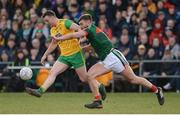 25 March 2018; Leo McLoone of Donegal  in action against Seamus O'Shea of Mayo during the Allianz Football League Division 1 Round 7 match between Donegal and Mayo at MacCumhaill Park in Ballybofey, Donegal. Photo by Oliver McVeigh/Sportsfile