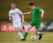 29 March 2018; Cian Murphy of Republic of Ireland in action against Liam Hassin of Northern Ireland during the Centenary Shield match between the Republic of Ireland Schools and Northern Ireland Schools at Monaghan United FC in Gortakeegan, Monaghan. Photo by Stephen McCarthy/Sportsfile