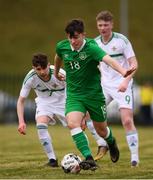 29 March 2018; Ronan Manning of Republic of Ireland in action against Donal Rocks, left, and Aaron McGurk of Northern Ireland during the Centenary Shield match between the Republic of Ireland Schools and Northern Ireland Schools at Monaghan United FC in Gortakeegan, Monaghan. Photo by Stephen McCarthy/Sportsfile