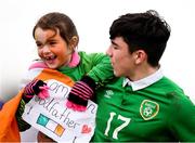 29 March 2018; Izzy King, age 6, with her godfather Liam Kerrigan of Republic of Ireland following the Centenary Shield match between the Republic of Ireland Schools and Northern Ireland Schools at Monaghan United FC in Gortakeegan, Monaghan. Photo by Stephen McCarthy/Sportsfile