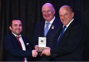 29 March 2018; Eammon Ó Culainn, left, of Focas Films with the Gradam Gaeilge award for &quot;Poc na nGael&quot; which is presented by Uachtarán Chumann Lúthchleas Gael John Horan, centre, and former Clare hurling manager Ger Loughnane during the GAA MacNamee Awards at Croke Park in Dublin. Photo by Matt Browne/Sportsfile