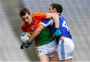 31 March 2018; Seán Gannon of Carlow in action against Gareth Dillon of Laois during the Allianz Football League Division 4 Final match between Carlow and Laois at Croke Park in Dublin. Photo by Piaras Ó Mídheach/Sportsfile