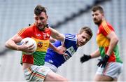 31 March 2018; Eoghan Ruth of Carlow in action against Mark Timmons of Laois during the Allianz Football League Division 4 Final match between Carlow and Laois at Croke Park in Dublin. Photo by David Fitzgerald/Sportsfile