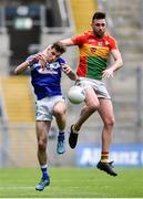 31 March 2018; Eoghan Ruth of Carlow in action against Trevor Collins of Laois during the Allianz Football League Division 4 Final match between Carlow and Laois at Croke Park in Dublin. Photo by David Fitzgerald/Sportsfile