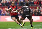 31 March 2018; Simon Zebo in action against Josua Tuisova of RC Toulon during the European Rugby Champions Cup quarter-final match between Munster and RC Toulon at Thomond Park in Limerick. Photo by Diarmuid Greene/Sportsfile