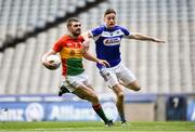 31 March 2018; Seán Murphy of Carlow in action against Kieran Lillis of Laois during the Allianz Football League Division 4 Final match between Carlow and Laois at Croke Park in Dublin. Photo by David Fitzgerald/Sportsfile