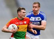 31 March 2018; Jordan Morrissey of Carlow in action against Donal Kingston of Laois during the Allianz Football League Division 4 Final match between Carlow and Laois at Croke Park in Dublin. Photo by Piaras Ó Mídheach/Sportsfile