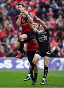 31 March 2018; Darren Sweetnam of Munster catches a high ball ahead of Chris Ashton of RC Toulon during the European Rugby Champions Cup quarter-final match between Munster and RC Toulon at Thomond Park in Limerick. Photo by Brendan Moran/Sportsfile