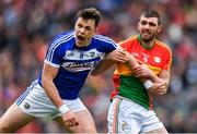 31 March 2018; John O'Loughlin of Laois and Seán Murphy of Carlow tussle during the Allianz Football League Division 4 Final match between Carlow and Laois at Croke Park in Dublin. Photo by Piaras Ó Mídheach/Sportsfile