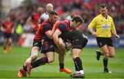31 March 2018; Anthony Belleau of RC Toulon is tackled by Sam Arnold and Darren Sweetnam of Munster during the European Rugby Champions Cup quarter-final match between Munster and RC Toulon at Thomond Park in Limerick. Photo by Brendan Moran/Sportsfile