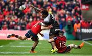 31 March 2018; Josua Tuisova of RC Toulon is tackled by Alex Wootton and Sam Arnold of Munster during the European Rugby Champions Cup quarter-final match between Munster and RC Toulon at Thomond Park in Limerick. Photo by Brendan Moran/Sportsfile