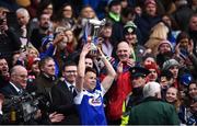 31 March 2018; Laois captain Stephen Attride lifts the trophy following the Allianz Football League Division 4 Final match between Carlow and Laois at Croke Park in Dublin. Photo by David Fitzgerald/Sportsfile
