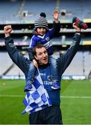 31 March 2018; Laois manager John Sugrue celebrates with his son Conor, age 5, following the Allianz Football League Division 4 Final match between Carlow and Laois at Croke Park in Dublin. Photo by David Fitzgerald/Sportsfile