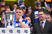 31 March 2018; Recently appointed Ard Stiúrthóir of the GAA Tom Ryan looks on before Laois captain Stephen Attride lifts the cup after the Allianz Football League Division 4 Final match between Carlow and Laois at Croke Park in Dublin. Photo by Piaras Ó Mídheach/Sportsfile