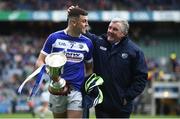 31 March 2018; Robert Pigott of Laois is congratulated by Lawrence Phelan, Laois GAA Football Chairman following the Allianz Football League Division 4 Final match between Carlow and Laois at Croke Park in Dublin. Photo by David Fitzgerald/Sportsfile