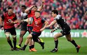 31 March 2018; Andrew Conway of Munster beats the tackle of Francois Trinh-Duc of RC Toulon on the way to scoring his side's second try during the European Rugby Champions Cup quarter-final match between Munster and RC Toulon at Thomond Park in Limerick. Photo by Brendan Moran/Sportsfile