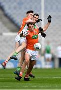 31 March 2018; Stephen Sheridan of Armagh, supported by team-mate Ben Crealey, behind, in action against Ryan Jones of Fermanagh during the Allianz Football League Division 3 Final match between Armagh and Fermanagh at Croke Park in Dublin. Photo by Piaras Ó Mídheach/Sportsfile